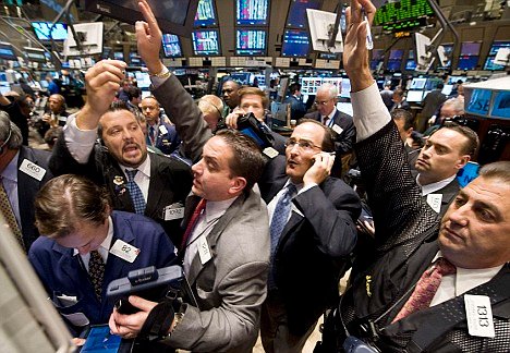 Traders working on the floor of the New York Stock Exchange during a trading session