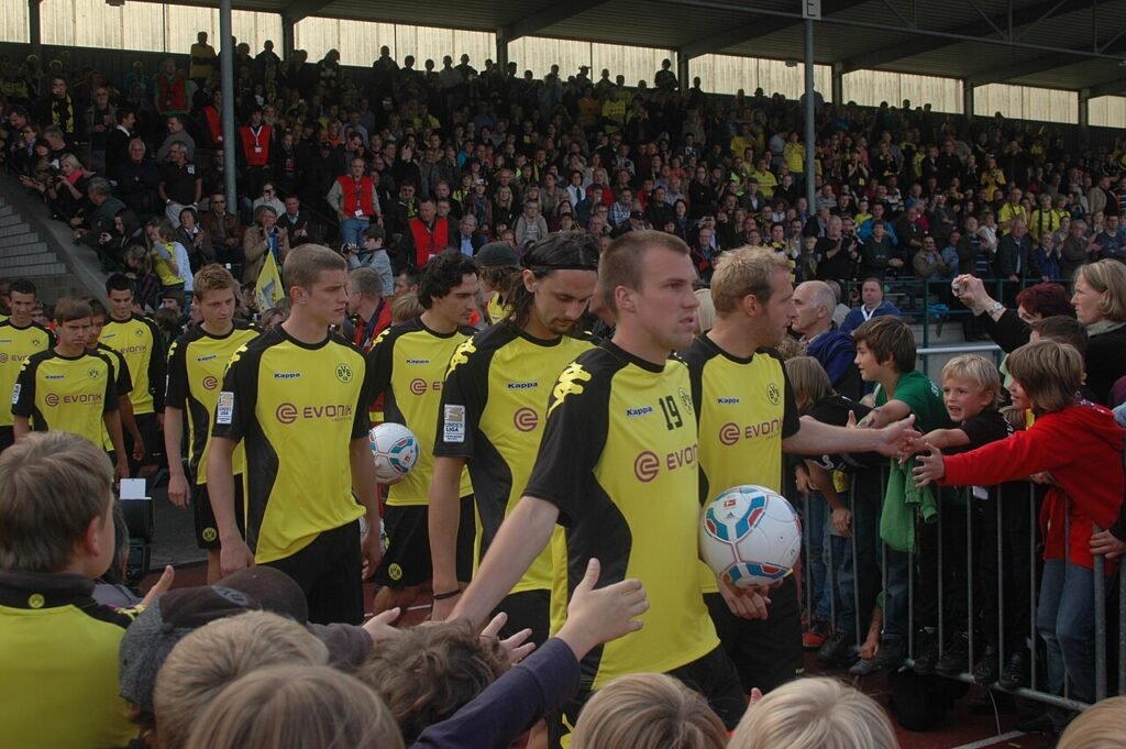 Borussia Dortmund fans in yellow and black at SIGNAL IDUNA PARK in Dortmund.